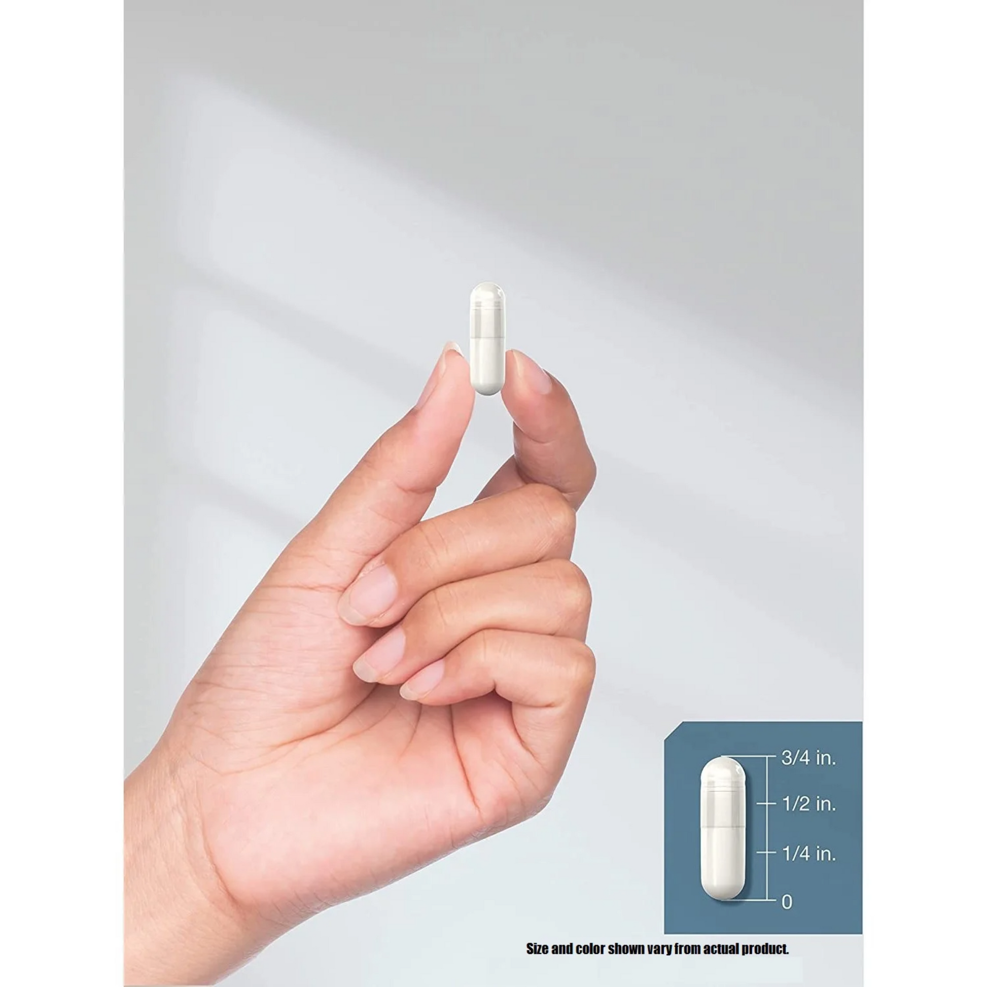 Hand holding a white capsule with size and color information displayed.